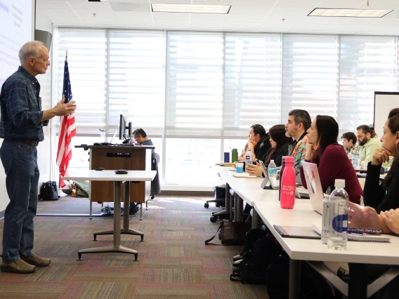 Stephen Cornell lectures to a packed classroom in the University of Arizona Law School during JIT 2024.