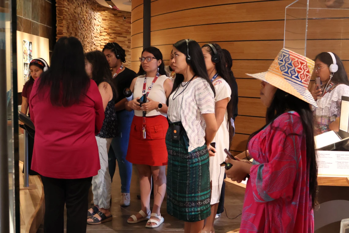 Students look at an exhibit at the Tohono O'odham Museum and Cultural Center during a private tour