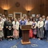 Interns pose with Udall Foundation and Udall Center staff and faculty and Senator Lisa Murkowski.